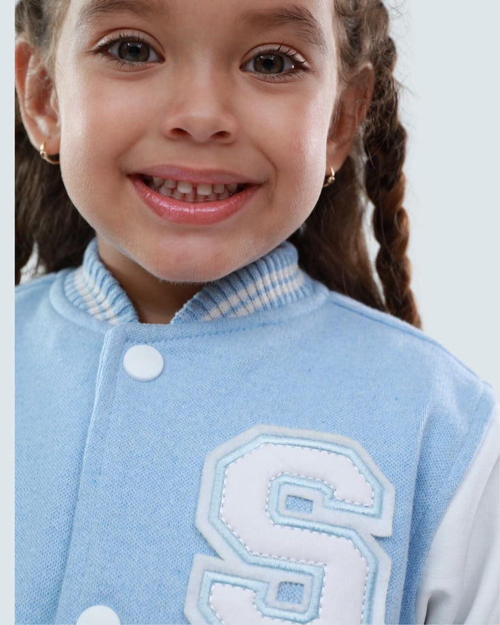 BEISBOLERA AZUL BEBE MANGA BLANCA